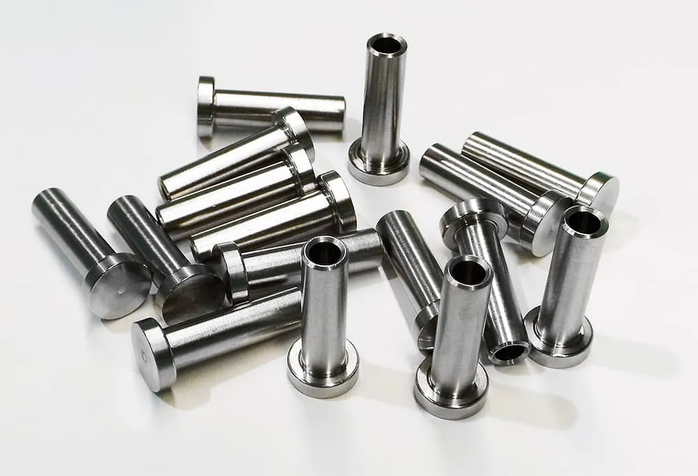 collection of 303 stainless steel machined pins and shafts