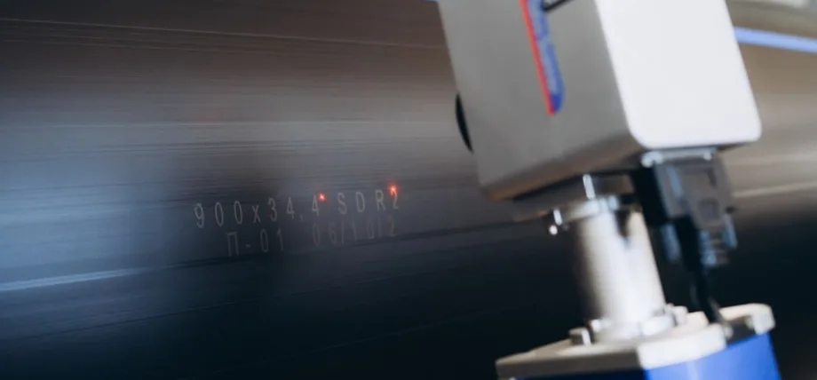 Industrial laser head engraving alphanumeric codes