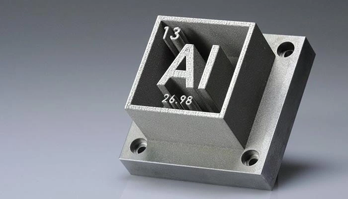 3D printed metal with an aluminum symbol “AI” with its atomic and mass number