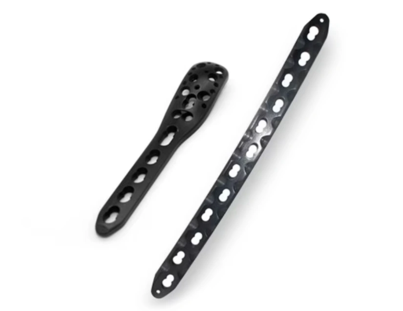Black PEEK orthopedic bone fixation plates with multiple screw holes for surgical implants