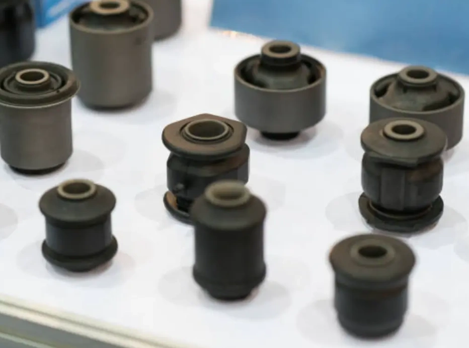 Injection-molded TPR rubber bushing components of varying sizes displayed on a white surface.