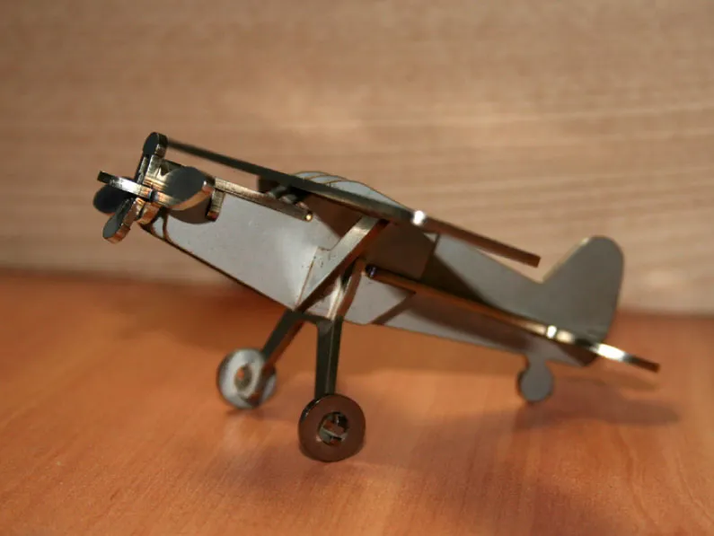 A laser-cut biplane model prototype with metal frame construction