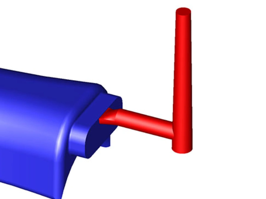 Image of an edge gate entering a molded part at the parting line, with red runner and sprue connected to a blue mold cavity