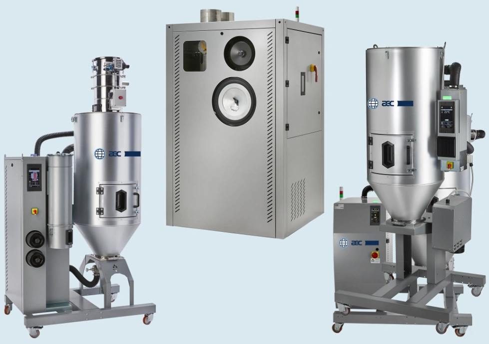 Three industrial plastic pellet dryers — two hopper dryers on wheels and one cabinet-style desiccant dryer unit.