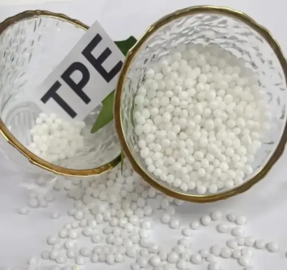 White recycled TPE pellets in gold-rimmed glass bowls