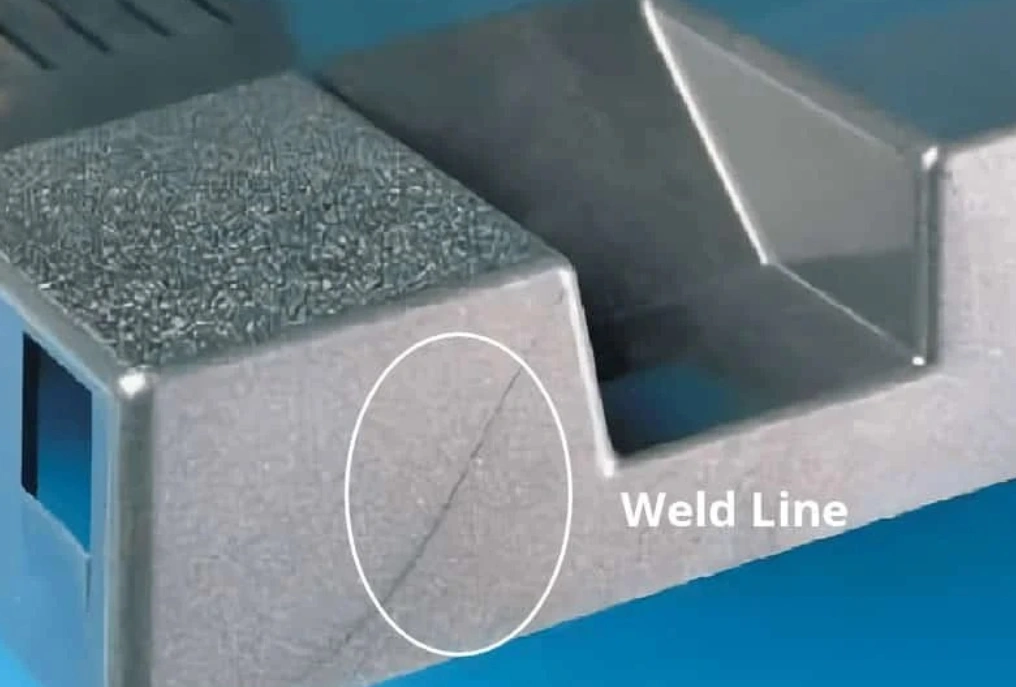 Visible weld line defect on an injection-molded plastic part, circled and labeled on the part's surface