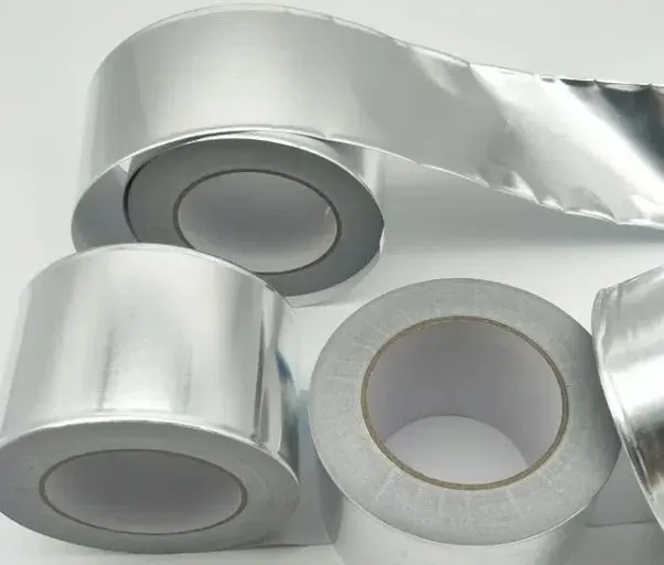 Image showing aluminium sheet rolls lying on a flat surface