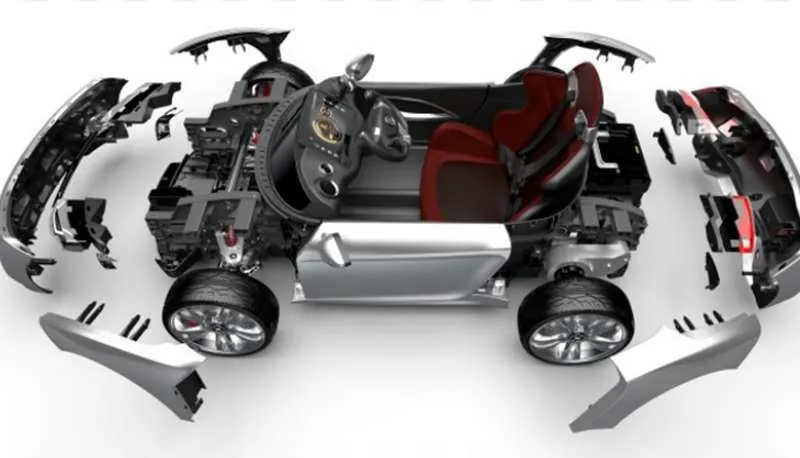 Disassembled view of different parts of an electric vehicle.