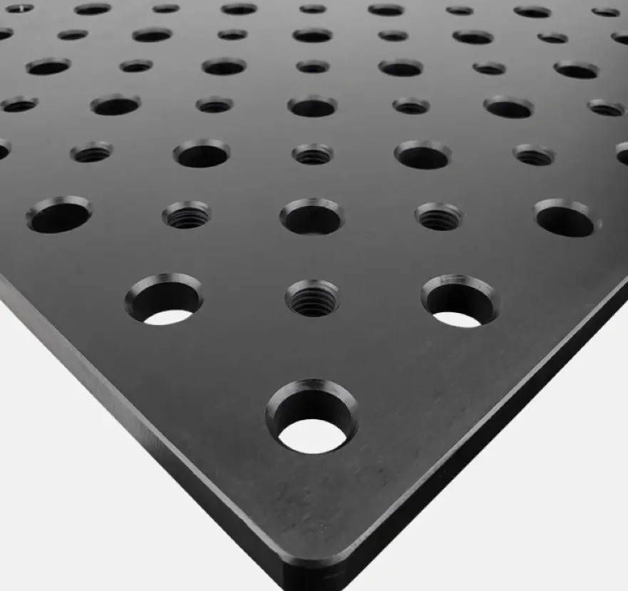 Modular fixture plate corner with reamed dowel holes and threaded mounting holes