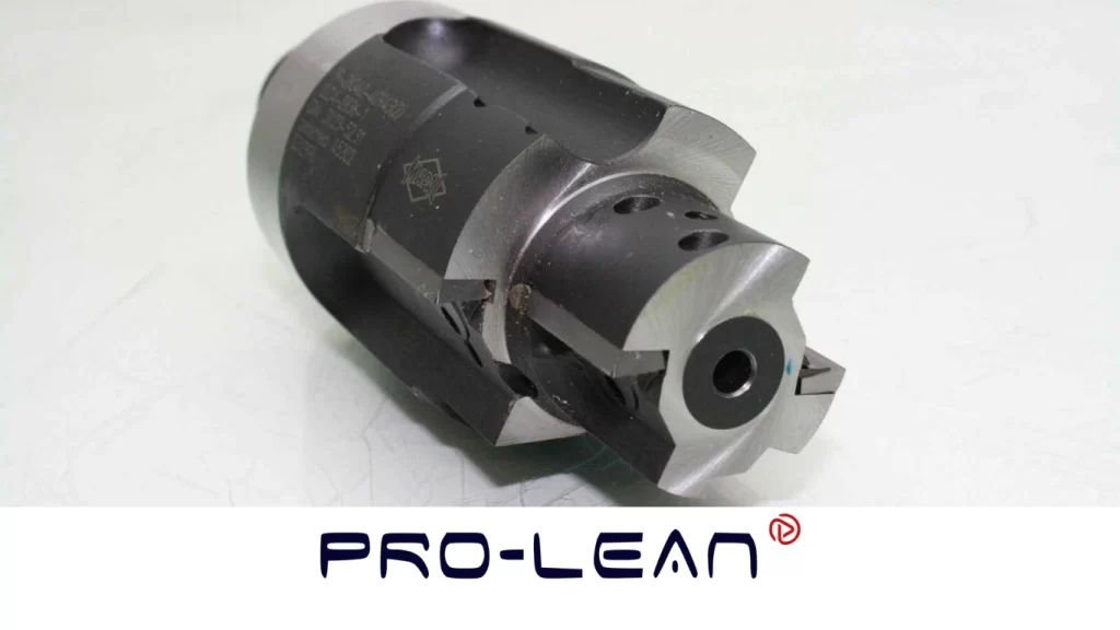 Close-up of an indexable reamer body with replaceable carbide inserts mounted on the cutting head