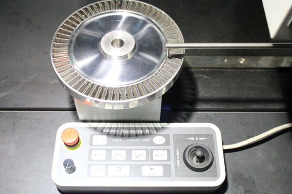 A circular turbine disc with numerous radial slots or vanes around its perimeter, made with EDM