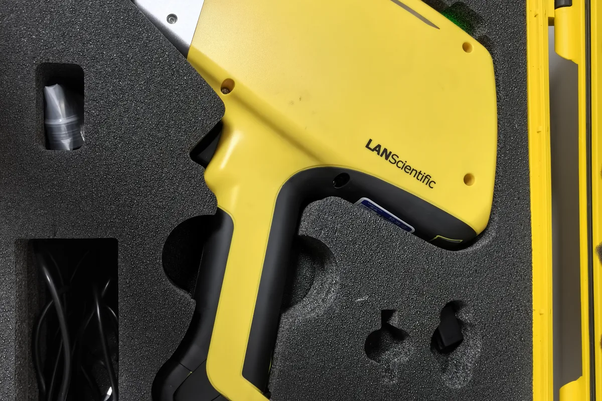 Handheld spectrometer used for alloy identification of incoming bar stock