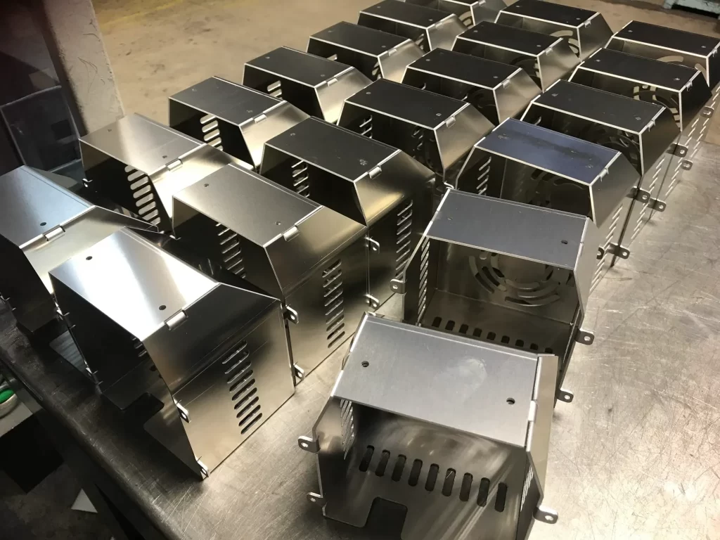 Stainless steel enclosures in bulk quantity placed in a storage room