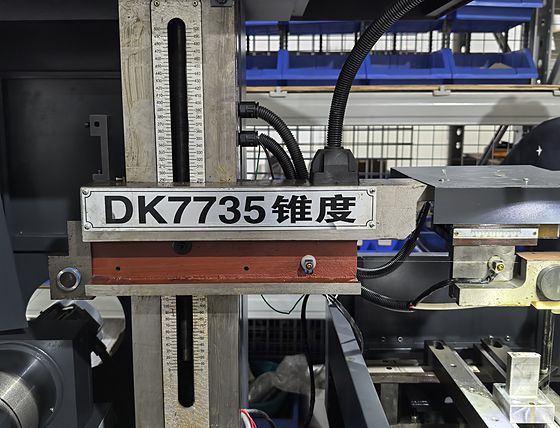The DK7735 wire electrical discharge machine, with its nameplate visible