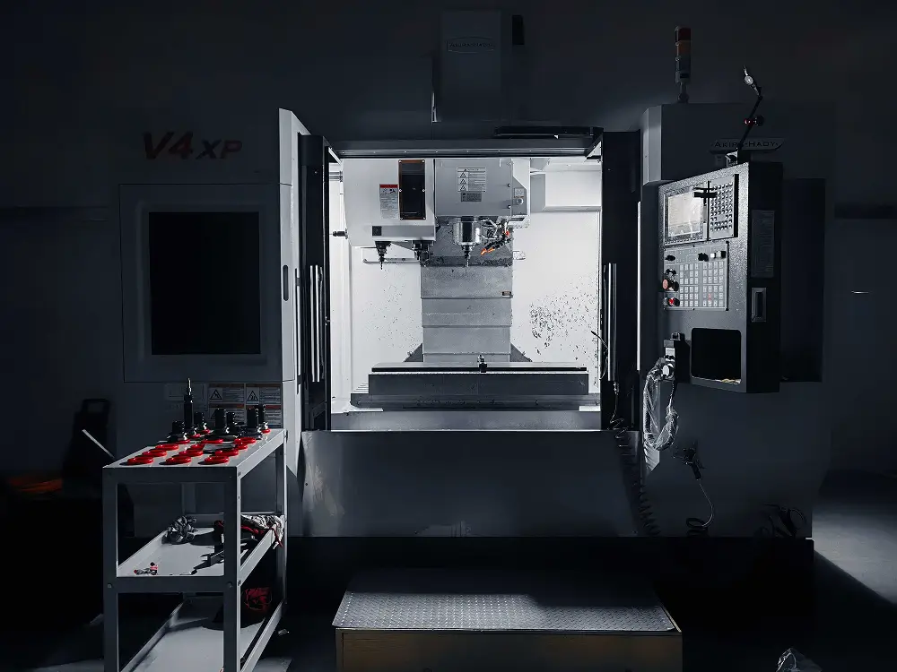 CNC machining centre cutting a metal part