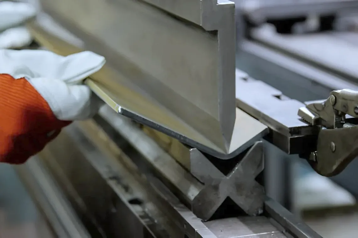 Close view of a sheet metal bending operation