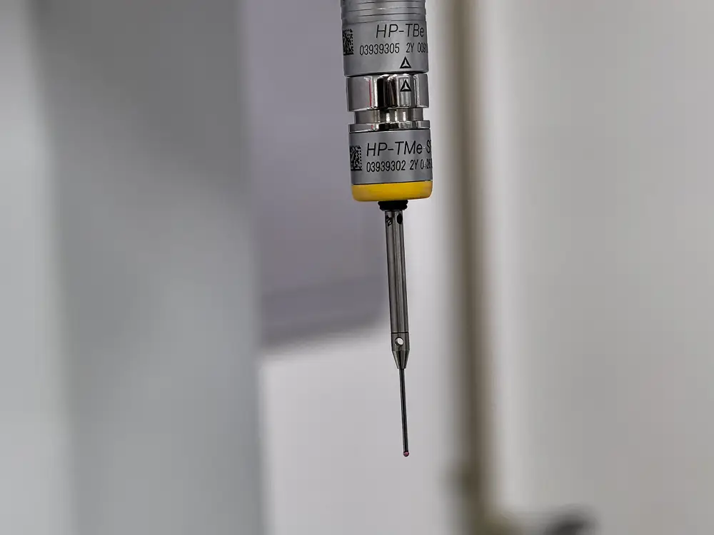 Coordinate measuring machine probe in the Prolean inspection area